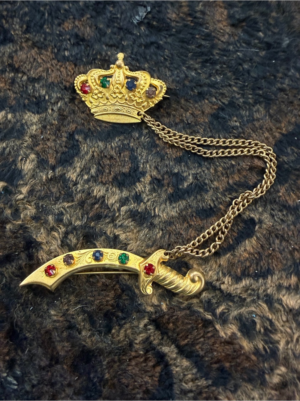 Gold Tone Crown and Scimitar Brooch with Multicolor Stones